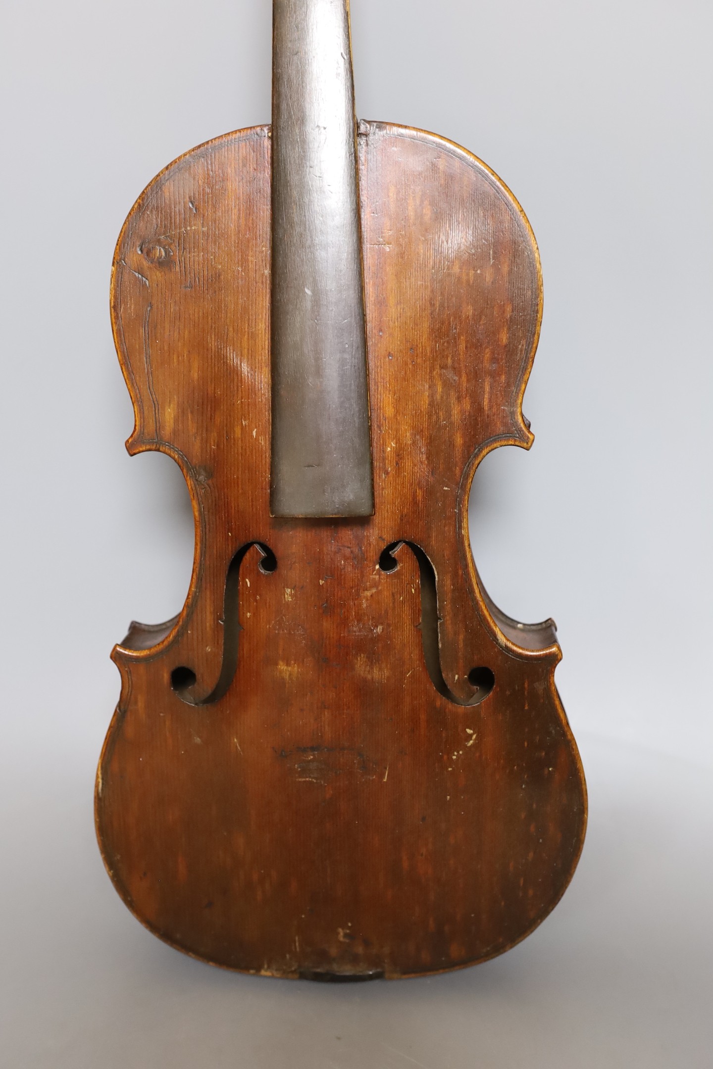 A European violin, circa 19th century, 59 cms long.